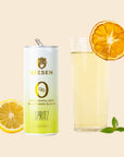 Cans and glass of Giesen Spritz with lemon and orange slices on a beige background - Giesen Sauv Blanc can