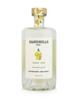 Bottle of Sandhills elixir with ginger lemon flavor on a white background