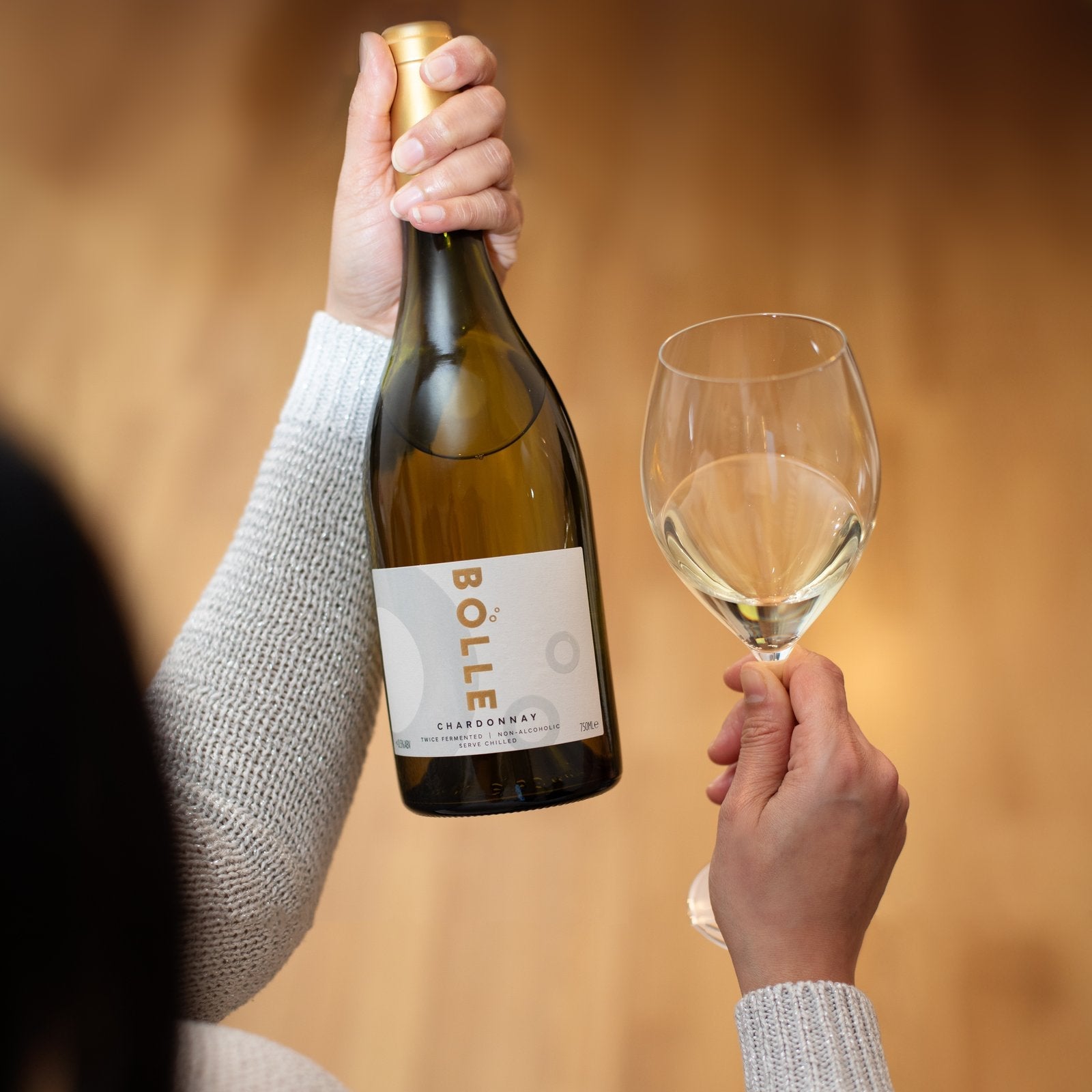Bolle Still White Chardonnay hand 