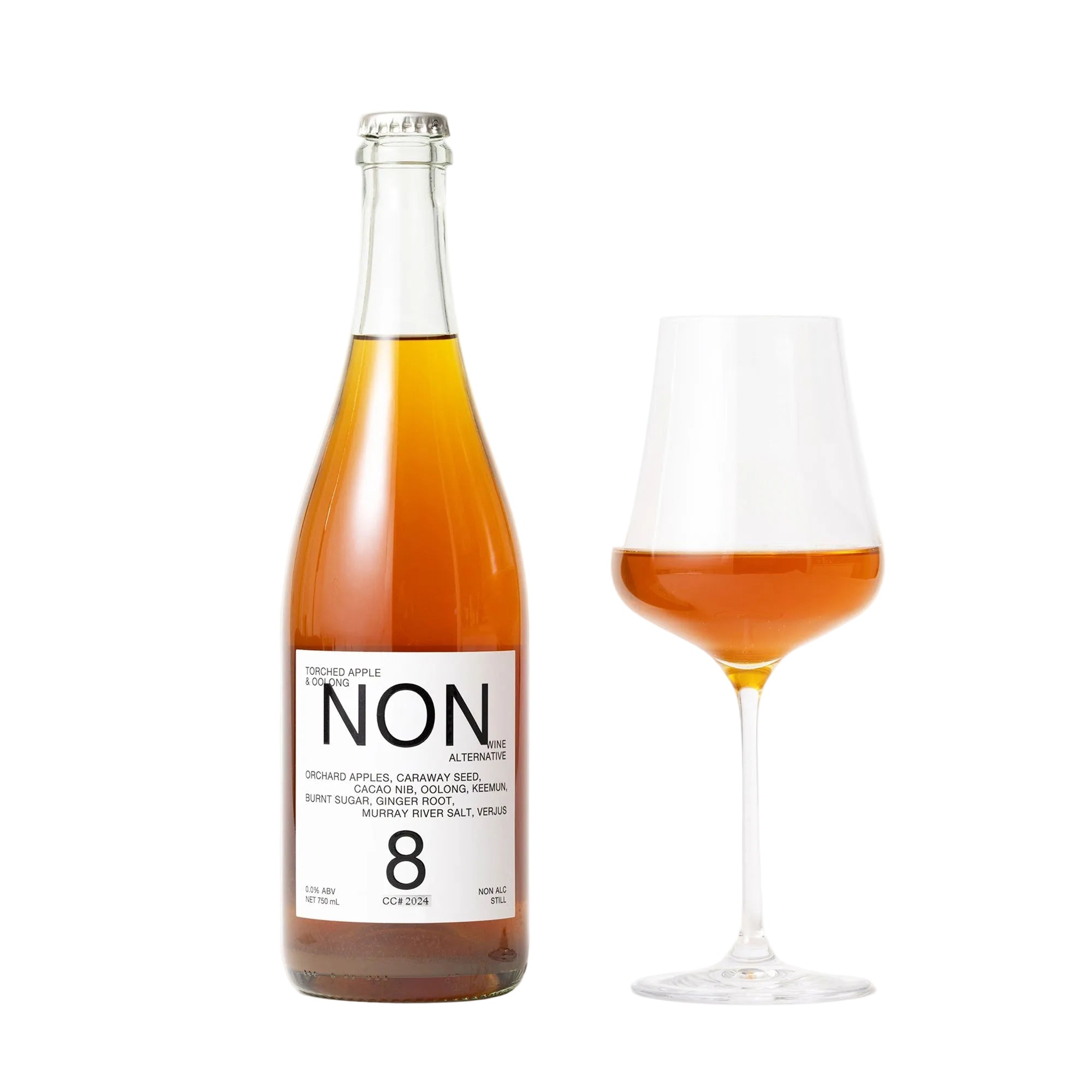Bottle and glass of non-alcoholic beverage labeled 'NON' on a white background