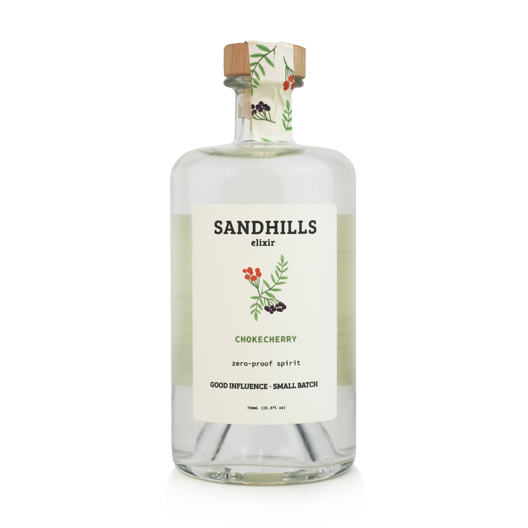 Clear glass bottle of Sandhills elixir with a decorative label on a white background