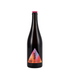 Black bottle with a colorful label on a white background, featuring a gold award badge.