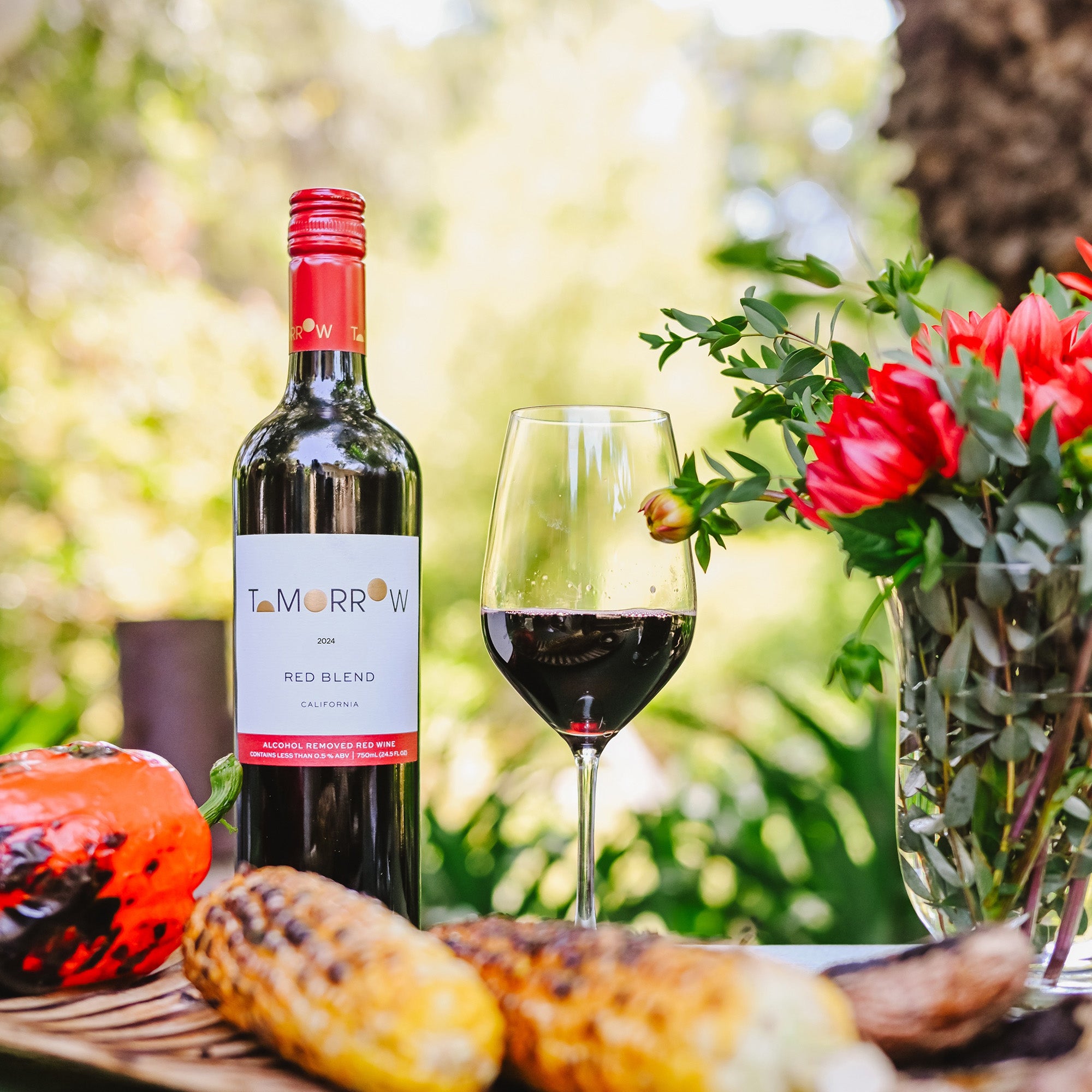 Tomorrow Cellars Red Blend in a garden with corn on the cob