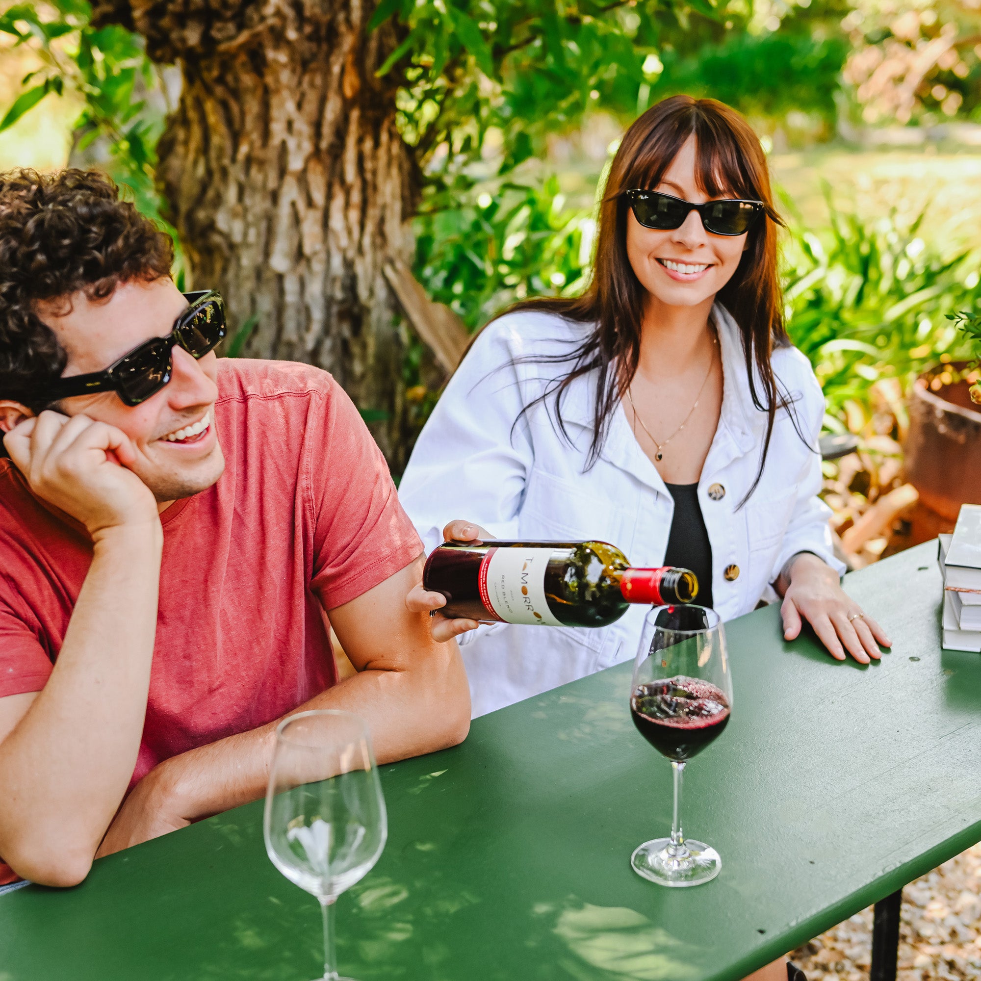 Tomorrow Cellars Red Blend being poured between friends