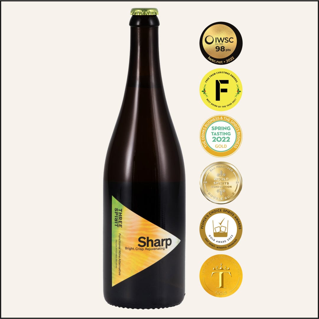 Bottle of Three Rook Sharp beer with multiple gold awards on a white background
